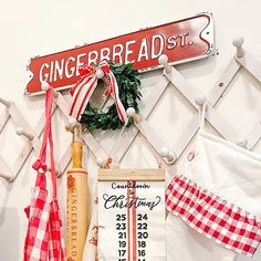 there is a sign that says gingerbread st on the wall next to kitchen items