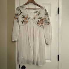 Jodifl White Floral Bohme Medium Aztec Boho Dress $98 Anthropologie White Floral Print Bohme Medium Aztec Boho Dress $98 Anthropologie Purchased From A Boutique. No Tag. New Without Tags. Super Soft Material. Pet And Smoke Free Home! I Have Tons Of Cute Stuff Listed. I Will Bundle! Chest Measures Laying Flat Across From Armpit To Armpit 19” Length 35” ***************** If You See Other Items Listed You Like, I Can Bundle! Just Click Add To Bundle On Every Item You Like And I Can Submit You One O Floral Embroidered V-neck Midi Dress For Vacation, Flowy Boho Tunic Dress For Brunch, Spring Vacation Boho Fitted Dress, Fitted Boho Dress For Spring Vacation, Summer Floral Embroidered Dress For Daywear, Summer Dress With Floral Embroidery For Daywear, Flowy V-neck Mini Dress For Daytime, Casual Fitted Boho Dress For Brunch, Fitted Boho Dress For Spring