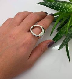 "Open Circle Ring, Solid Sterling Silver, Geometric Circle Ring, Statement Ring, Boho Ring, Large Circle Ring, Minimalist Ring, Hoop Ring Solid sterling silver large geometric open ring, with polished finish unique style perfect for those who are looking for something a little different.. ✔~ 100% Handmade ~ ✔~ 100% SOLID 925 Sterling Silver ~ ✔~ Internal hole opening 14,0 MM ~ \"the upper part\" ~ ✔~ Weight 11.0 grams \"in medium size\" ~ ✔~ Μade to order ~ ✔~ Free shipping ~ ✔~ Available Expres Modern Hoop Rings For Anniversary, Modern Open Circle Promise Ring, Modern Handmade Stackable Rings With Open Band, Modern Handmade Stackable Rings For Everyday, Modern Handmade Stackable Open Band Rings, Silver Hoop Rings For Everyday, Modern Open Circle Ring For Gift, Modern Metal Round Stackable Rings, Modern Stackable Open Circle Rings As Gift