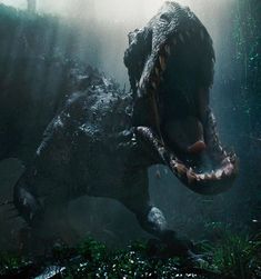 a large dinosaur with its mouth open in the jungle