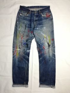 Fullcount Selvedge Jeans Lot 1101 Made in Japan Ripped and reinforced nicely Superb faded from raw denim Custom with splattered paint One of a kind! ACTUAL MEASUREMENT (Inch) Waist 31 Outseam 43 Inseam 33 Leg Opening 8 Rise 10.5 Thigh 12 CN267 NOTE 1) All items are 100% authentic. 2) All items should be WASHED before use. 3) Do not rely on tag size as pre-worn items may have been altered, stretched or shrunk. 4) The best way to ensure a correct fit is to compare our measurements with the measurements of a similar item that you know fits you well. 5) Please refer all images, and enlarge them for better details. 6) All measurements are been taken with the garment flat on the floor. 7) NO RETURN NO REFUND AFTER PURCHASE. 8) Please do not expect it to be like new as mostly are used item, unles Recycled Denim Selvedge Jeans In Washed Blue, Streetwear Dark Wash Reworked Jeans, Selvedge Rigid Denim Bottoms For Streetwear, Faded Selvedge Jeans For Streetwear, Faded Vintage Reworked Jeans, Paint Denim, Raw Denim Fades, Splattered Paint, Paint Splatter Jeans