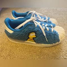 Adidas X The Simpsons Shoes Blue Teddy Bear Fur Brand New!!! No Box. Marking On Bottom Is From Marker From Store Trendy Blue Slip-on Sneakers, Blue Adidas Slip-on Sneakers, Blue Lace-up Fun Sneakers, Adidas Blue Sneakers With Round Toe, Adidas Blue Round Toe Sneakers, Blue Fun Sneakers With Rubber Sole, Fun Blue Sneakers With Rubber Sole, Simpsons Shoes, Blue Teddy Bear