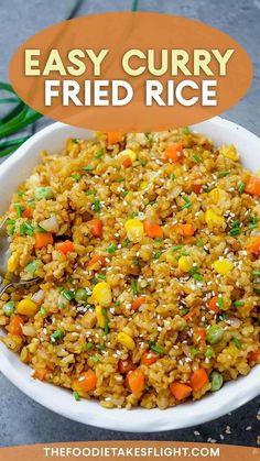 fried rice in a white bowl with carrots and green onions on the side text overlay says easy curry fried rice