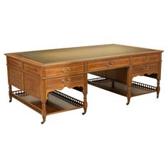 two wooden desks with drawers on each side and an open drawer underneath the desk