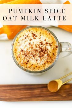 pumpkin spice oat milk latte in a glass mug