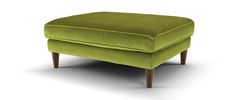 a green foot stool with wooden legs on an isolated white background for display or montage