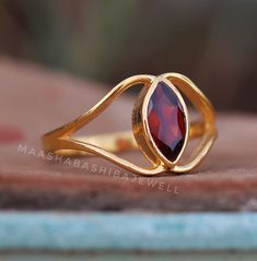 Marquise Cut Natural Garnet Ring, Wedding Ring, 925 Sterling Silver, Red Garnet Ring, Birthstone Ring, 18k Gold Vermeil, Dainty Women Ring SHOP LINK:- https://www.etsy.com/shop/MaaShabashibaJewell?ref=seller-platform-mcnav 》D E T A I L S《 Gemstone: Natural Garnet                     Gem Color: Red                      Gem Shape: Marquise                                  Gem Category: Cut                    Metal: 925 Sterling Silver Purity: 925 Parts Per 1000 Setting Type: Bezel Set Silver Polis Dainty Women, Garnet Wedding Rings, Red Garnet Ring, Garnet Gem, Ring Birthstone, Garnet Ring, Stone Texture, Women Ring, Garnet Rings