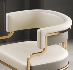 a white chair with gold trim around it