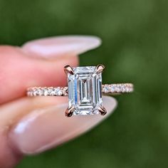 Dainty Setting In Rose Gold With A Beautiful Emerald Cut Lab Grown Diamond. The Lab Grown Diamond Is Igi Laboratory Certified And A Report Certificate Will Be Included With Purchase. The Setting Is Made From 14kt Solid Rose Gold, 585 Purity, All Set With Natural Earth-Mined Diamonds. The Ring Diamond Is 3/4 Way, Which Is Past The Half Way Mark So When It Slightly Off Centers, The Diamond Still Shows. Metal: 14k Rose Gold Gold Cut:Emerald Cut Carat: 1.50 Ct Color: E Clarity: Vs1 Accent Stone: Gen Emerald Cut Diamond Engagement Ring, Colored Engagement Rings, Lab Diamond Engagement Ring, Emerald Engagement Ring Cut, Emerald Engagement Ring, Emerald Cut Diamonds, Ring Diamond, Natural Earth, Gold Gold