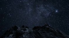 the night sky is filled with stars and some dark mountains are in the foreground