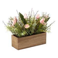 a wooden box filled with pink flowers and greenery