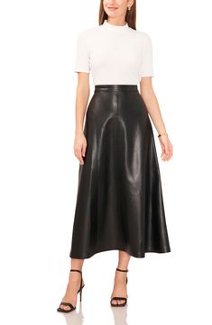 Fall for the perfect A-line silhouette of this skirt elevated in sleek faux leather. 37" center front length ( size Medium) Hidden back-zip closure Unlined 100% polyester Machine wash, line dry Imported