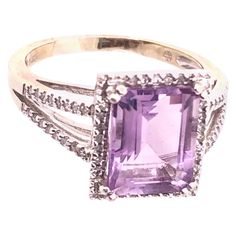 14 Karat White Gold Fashion Amethyst Ring with Diamonds 0.40 TDW. Size 7.5 4.30 grams total weight. Fine Jewelry Purple Rings With Diamond Accents, Amethyst Diamond Ring With Accents, Fine Jewelry, Fine Jewelry Amethyst Diamond Ring With Accents, Amethyst Diamond Ring With Accents In Fine Jewelry Style, Fine Jewelry Amethyst Ring With Diamond Accents, Fine Jewelry Amethyst Ring With Accent Stones, Fine Jewelry White Gold Amethyst Ring With Diamond Accents, Formal Amethyst Rings With Diamond Accents, Formal Lavender Emerald Cut Ring