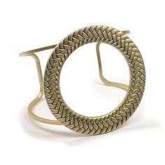 "This bracelet is a modern interpretation of a mid-century 1960s favorite. So true to the era and so relevant to current fashion, it has presence and clean simplicity. A bronze braided circle spans this open cuff, its graceful lines conforming to your wrist. Open cuff is sturdy and is adjustable to your wrist size. Fits sizes 6\" to 8\" wrists. Circle is 2-5/8\" diameter. Signed Sweet Romance Jewelry. Cast and fabricated by hand in our Los Angeles, USA studio." 1960s Jewelry, Locket Bracelet, Circle Bracelet, Mid Century Jewelry, Jewelry Simple, Sweet Romance, Metal Bracelet, Retro Jewelry, Bracelet Online