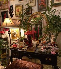 a living room filled with furniture and lots of plants on top of a wooden table