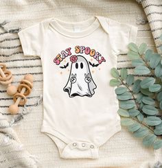 "Stay Spooky Toddler Shirt, Halloween Baby Onesie®, Retro Ghost Shirt, Retro Halloween Shirt, Spooky Baby Onesie®, Stay Spooky Youth Shirt, Toddler Shirt, Funny Halloween Baby Clothes, Funny Halloween Bodysuit, Kids Shirt, Cute Halloween Clothes, Halloween Gift for Kids, Halloween Youth Shirt, Halloween Toddler Shirt, My First Halloween Welcome to SareKidsStyle! HOW TO ORDER * Please review all the information provided before placing an order. 1. Select the style and size using the drop-down men White Halloween Onesie In Casual Style, Casual White Onesie For Halloween, White Casual Onesie For Halloween, Halloween Onsies, White Casual Halloween Onesie, Spooky One Shirt, Halloween Playtime Cotton Onesie, Cute White Halloween Onesie, Halloween Cotton Onesie For Playtime