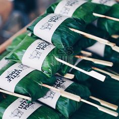 several skewered food items are displayed on sticks