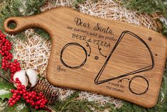 a personalized cutting board with the words dear santa on it next to christmas decorations