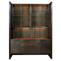 a wooden cabinet with glass doors on the top and bottom shelves in dark brown wood