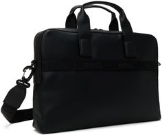 Buffed faux-leather briefcase in black. · Grained faux-leather trim throughout · Twin carry handles · Adjustable and detachable logo-woven crossbody strap · Logo hardware at face · Zip pocket · Logo-woven luggage strap at back face · Two-way zip closure · Laptop compartment at interior · Zip pocket and patch pockets · Logo-woven twill lining · Logo-engraved gunmetal-tone hardware · H11 x W15 x D3 Supplier color: Black Modern Black Briefcase With Leather Trim, Business Briefcase With Leather Trim In Black, Black Leather Trim Briefcase For Business, Black Leather-trimmed Briefcase For Business, Modern Rectangular Laptop Bag With Leather Trim, Black Luxury Laptop Bag With Adjustable Strap, Modern Rectangular Briefcase With Leather Trim, Black Business Bags With Leather Trim, Rectangular Laptop Bag With Leather Trim For Business Trips