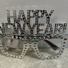 New With Tags The New Year Glasses Are Attractive Among Children And Adults. Funny And Festival Text Design, Create A Festive Atmosphere In New Year Day. You Can Wear The Glasses For Various Occasions Such As Party, Costume Party, Celebration, New Year Party, Which Will More Highlights To You. Features -Color: Silver -Material:Plastic -Size:14.50x14.00x10.00cm/5.70x5.50x3.93in New Year Glasses, Louis Vuitton Glasses, New Year Day, Smith Sunglasses, Chanel Glasses, Fashion Reading Glasses, Gucci Eyeglasses, Gucci Glasses, Oval Eyeglasses