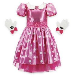 a pink minnie mouse dress and matching gloves for girls with white polka dots on it