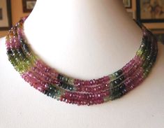 "Rondel faceted shape necklace of four strands of authentic multicoloured tourmalines. It carries a 925 sterling silver brooch yellow gold plated, with a peridot.  Dimensions: The shortest necklace back are 16,5\" and the longest 18,5\"  Tourmalines are size 3 x 2 mm. rondel. Materials used: Authentic natural multicoloured tourmalines. Yellow gold plated brooch, with a peridot. Handmade." Multicolor Beads Necklace Indian, Beads Necklace Indian, Fancy Glasses, Rajputi Jewellery, Colette Patterns, Multicolor Jewelry, Junk Jewelry, Necklace Indian, Antique Jewelry Indian