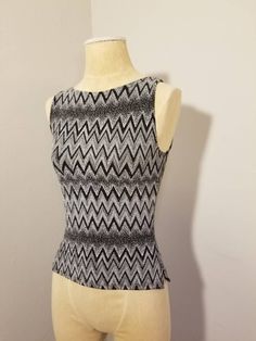 "++ IZ BYER CALIFORNIA TOP ++ Awesome metallic glitter top Zig zag design Sleeveless Small side slits on both sides Size M Made in the USA In wonderful, gently used condition ✂ - - - Measurements laid flat: Pit to pit: 14.5\" Waist: 13\" Top to bottom: 20\" Let's be friends! https://www.facebook.com/TheGirlSaidYesVintage round rack" Sleeveless Party Tank Top, Sleeveless Fitted Top For Parties, Fitted Sleeveless Top For Party, Y2k Sleeveless Party Tops, Casual Fitted Party Vest, Y2k Fitted Sleeveless Tops, Y2k Tank Top For Night Out, Y2k Style Fitted Sleeveless Tops, Y2k Fitted Party Vest