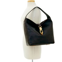 Soft and Chic     The Logo Lock Shoulder Bag owes its soft, slouchy shape and understated style to natural Florentine leather. A gold plated closure keeps contents secure, a wide shoulder strap guarantees comfort and a roomy interior provides great storage space. Both casual and chic, this bag will take you from workday lunches to Sunday brunches with ease. Formal Hobo Bag With Gold-tone Hardware, Versatile Formal Hobo Bag With Gold-tone Hardware, Classic Gold Hobo Bag With Gold-tone Hardware, Gold Hobo Bag For Formal Occasions, Elegant Hobo Bag With Gold-tone Hardware For Travel, Elegant Travel Hobo Bag With Gold-tone Hardware, Elegant Gold Hobo Bag With Detachable Strap, Elegant Gold Hobo Bag, Gold Leather Hobo Bag For Formal Occasions