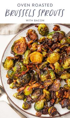 a white plate topped with brussel sprouts on top of a table