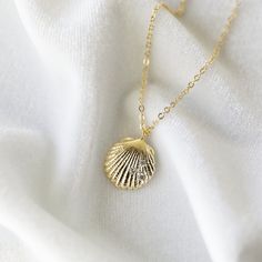 "Beautiful and lovely gold shell pendant necklace. Made of shell pendant with skinny gold plated brass chain. Soft and warm. The necklace is good for yourself or gift ! Your necklace will ship in a lovelike gift box. If you have any question please feel free to contact me. Thanks :) ♥ Chain length available 15\" - 20\" ♥ Pendant 1/2\" ♥ Gold plated over brass / Cubic Zirconia ♥ ♥ ♥ ♥ ♥ ♥ ♥ ♥ ♥ ♥ ♥ ♥ ♥ ♥ See more by lovelikestyle lovelikestyle.etsy.com ♥ ♥ ♥ ♥ ♥ ♥ ♥ ♥ ♥ ♥ ♥ ♥ ♥ ♥" Gold Shell-shaped Charm Necklace For Gift, Gold Shell Necklace With Delicate Chain For Gifts, Gold Shell Necklace With Delicate Chain As Gift, Gold Shell Charm Necklace As A Gift, Gold Shell Necklace As A Gift, Gold Shell Necklace Perfect As A Gift, Dainty Shell Necklace For Gift, Dainty Shell Charm Necklace For Gift, Dainty Gold Shell Charm Necklace