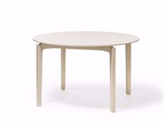 a white table with an oval shaped top and two legs, on a white background