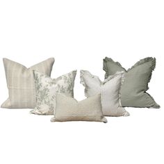 four pillows in various colors and sizes