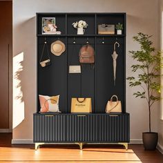 an entryway with a coat rack filled with purses and hats