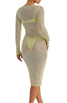 Make a scene-stealing statement in this sheer, shimmery midi dress paired with a matching bra and panties for a daringly flirtatious look. Slips on over head Scoop neck Long sleeves Dress is unlined; panties have lined gusset Dress is 95% polyamide, 5% elastane; bra and panties are 90% polyester, 10% elastane Dry clean Imported Knee-length Mesh Dress For Party, Sheer Mesh Dress For Club And Party Season, Sheer Mesh Dress For Date Night And Party Season, Glamorous Fitted Mesh Dress, Mesh Midi Dress For Party, Sheer Mesh Knee-length Party Dress, Sheer Mesh Midi Dress For Party, Sheer Fitted Mesh Dress For Party Season, Glamorous Sheer Mesh Dress For Party Season