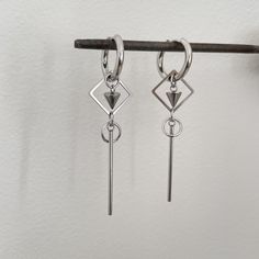 Introducing our effortlessly chic geometric dangling earrings in stainless steel - a must-have addition to your jewelry collection! These trendy unisex earrings are perfect for both men and women, adding a modern touch to any outfit. The sleek, minimalist design makes them versatile for any occasion, whether you're dressing up for a night out or adding a subtle statement to your everyday look. Elevate your style with these geometric earrings that are sure to turn heads and make you stand out fro Kpop Jewelry, Unisex Earrings, Earrings For Men, Steel Earrings, Dangling Earrings, Stainless Steel Earrings, Geometric Earrings, Everyday Look, Favorite Jewelry