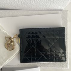 Shiny Black Holds Around 10 Cards And Cash Comes With No Box Just Wallet No Gold Dior Charms Luxury Black Wallet For Gift, Luxury Wallets With Gold-tone Hardware As Gift, Luxury Black Card Holder With Coin Pocket, Black Hold, Modern Wallet, Black Wallets With Gold-tone Hardware, Luxury Black Wallets With Gold-tone Hardware, Dior Wallet, Key Card Holder