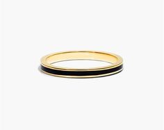 14K Yellow Gold Black Enamel Ring. It is simply impossible to deny the beauty of this ring. Wear it alone or layer it with additional bling, this ring will give the ultimate style. Classic Everyday Jewelry With Black Enamel, Elegant Enamel Rings With Polished Finish, Elegant Gold Enamel Ring With Round Band, Minimalist Yellow Gold Enamel Ring For Formal Occasions, Classic Black Enamel Ring For Anniversary, Classic Enamel Ring, Elegant Black Enamel Ring For Promise, Elegant Enamel Stackable Rings As Gift, Classic Enamel Ring Jewelry