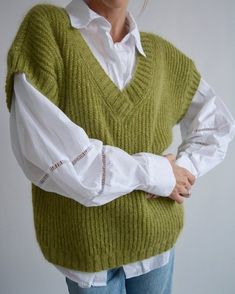 Hello, I'm the one, who won't let you down - green mohair vest. I will comfort you, keep you warm and will make you smile. I'm 100% hand made and proud of that. I consist of 70% knitt mohair and 30% of nylon, which makes me increadibly natural. I'm quite unique as could be worn all year long.I'm going well with dress, jeans, skirts ... or pretty much with everything you want. I'M AVAILABLE IN  DIFFERENT COLOURS!!!🌈I'm in one size and one size fits all because my measurements are :❤️   Width -54 Green V-neck Vest For Winter, Green Knitted Winter Vest, Sleeveless Green Sweater For Fall, Green Knitted Sleeveless Sweater Vest, Green Knit Sleeveless Vest, Green Sleeveless Knitted Sweater, Green Sleeveless Knit Vest, Green Knit Vest For Fall, Hand Knitted Sleeveless Winter Vest