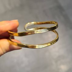 Elegant Hand Forged Adjustable Bangle, Hand Forged Adjustable Round Bangle, Gold Open Band Bracelets As Gift, Adjustable Hand Forged Bangle, Gold Open Band Bracelet As Gift, Adjustable Hand Forged Round Bangle, Gold Open Band Bracelet Gift, Elegant Adjustable Hand Forged Cuff Bracelet, Handmade Minimalist Brass Bracelets