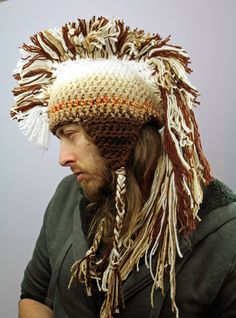 This Handmade accessory is very unique. White to dark brown and tan yarn weave an ombre gradient to create a stylish mohawk earflap hat. It has ear flaps and tassels that hang down and a fringe that is long and dramatic Mohawk down the center. It has been crochet with super thick and warm white and earth toned yarn. It is double threaded and super warm. It has a lot of charm and spunk. You are sure to stand out and make a statement in this hat! It's cozy, warm, and edgy. Ask me about custom orde Brown Brimmed Crochet Hat For Festival, Brimmed Brown Crochet Hat For Festival, Adjustable Brown Crochet Hat For Festivals, Mohawk Crochet Hat, Crochet Mohawk, Granny Square Step By Step, Barbie Hat, Step By Step Crochet, Earthy Brown