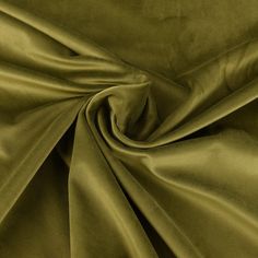 a close up view of a green fabric