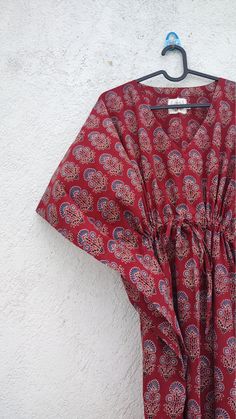 "Its  a  hand block print and pure cotton fabric kaftan . It is made of 100 % cotton material . Great for summers. Size -  1---FIRST SIZE -----       WIDTH --      60 INCH        LENGTH --   57 INCH         NECK --        8 INCH         If any alteration is required please contact seller.        100 % cotton fabric. 2---SECOND SIZE ------       WIDTH --    70 INCH       LENGTH--   57 INCH        NECK --       8 INCH        If any alteration is required please contact seller.       100% cotton fa Red Bohemian Loungewear Dress, Red Cotton Bohemian Kaftan, Red Bohemian Cotton Kaftan, Red Cotton Maxi Kaftan, Red Cotton Kaftan For Festival, Traditional Block Print Kaftan For Loungewear, Printed Red Kaftan For Beach Cover-up, Red Printed Kaftan For Beach Cover-up, Red Block Print Maxi Dress For Beach