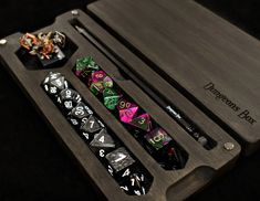 the dice board is set up with several different types of dices and their holders