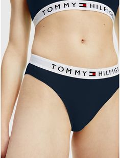 Tommy Hilfiger women's underwear. Made from soft, stretch cotton with an elastic logo waistband, our panty has a comfortable fit, and smooth silhouette.  Material: 91% Cotton, 9% Elastane. Summer Stretch Bottoms With Logo Waistband, Cotton Briefs With Logo Waistband, Stretch Briefs With Logo Waistband, Sporty Fitted Bottoms With Logo Print, Tommy Hilfiger Stretch Cotton Bottoms, Sporty Stretch Bottoms With Logo Print, Stretch Bottoms With Logo Waistband For Loungewear, Tommy Hilfiger Women, Stretch Cotton