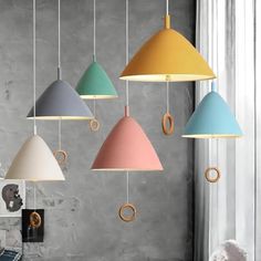 multicolored pendant lights hanging from the ceiling