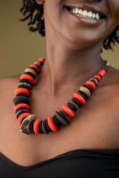 Unique Africa Maasai Handcrafted Leather Beaded Necklace with an Elegant Look and Brilliant Finish. Color = Orange, Brown, and Black. Length (Around Neck) =20 Inches. **GET FREE SHIPPING FOR ADDITIONAL ITEMS PURCHASED. Yes, Buy Multiple Items and pay shipping for 1 item only- The rest ships Free. (No Limits on the number of Multiple items). With a faster delivery time of 3 days via DHLExpress, Worldwide. Ordinary/Standard Shipping also available upon request. We Custom Make to Suit Your Taste. A Adjustable Orange Necklace With Wooden Beads, Unique Orange Jewelry With Wooden Beads, Unique Orange Necklace With Wooden Beads, Unique Orange Necklace With Large Beads, Orange Wooden Beads For Jewelry Making, Handmade Orange Round Necklace, Leather Beaded Necklace, African Inspired Jewelry, Necklace African