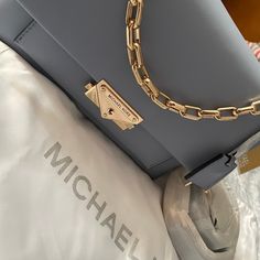 Brand New Tags Still Attached Cleaning Out My Closet Can Be Worn As Shoulder Bag Or Crossbody Purchased At Retail Store Not Outlet Michael Michael Kors Cece Medium Leather Shoulder Bag Olive -Baby Blue Cece Shoulder Bag. -100% Leather. -Gold-Tone Hardware. -Adjustable Shoulder Strap. -Interior Slip Pocket, Card Slot. -Size: 24 * 16 * 11 Cm. Classic Blue Shoulder Bag With Chain Strap, Luxury Blue Bag With Chain Detail, Luxury Blue Bags With Chain Detail, Luxury Blue Bags With Chain, Elegant Blue Bag With Chain Detail, Luxury Blue Chain Bags, Formal Blue Bag With Chain, Designer Blue Bag With Chain Strap, Trendy Michael Kors Bag With Chain Strap