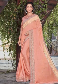 Peach satin silk embroidered saree with blouse 41120  Desc:  Color : Peach Saree Fabric : Satin Silk Work : Embroidery Wash Care : Dry clean Sleeve Style : Quarter Sleeve Long Sleeves : Done only in Custom Stitch Sleeves Lining : Done only in Custom Stitch Bust Size : 32 to 40 Inches Occasion : Wedding   Kitty Party   Sangeet   Party Wear   Reception   Gudi Padwa. With Express Free Shipping and Custom Stitching, Buy Indian Party wedding wear Bridal saris Peach satin silk embroidered saree with b Saree Black, Bridal Sari, Peach Saree, Chiffon Sarees, Paithani Saree, Traditional Silk Saree, Saree Designer, Wedding Green, Latest Designer Sarees