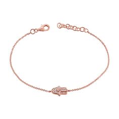 Embrace protection and elegance with this stunning 14K Gold Hamsa Chain Bracelet. The delicate chain showcases a beautifully crafted Hamsa charm, a symbol of good fortune and protection, adorned with shimmering diamonds totaling 0.12 carats. The brilliant diamonds enhance the charm's intricate design, adding a touch of sparkle and sophistication. Perfect for daily wear or special occasions, this bracelet features a secure clasp for a comfortable and worry-free fit. Whether as a meaningful gift o Elegant Diamond Bracelets With Charms, Elegant Diamond Charm Bracelets, Tennis Jewelry, Bracelet With Diamonds, Engagement Rings Couple, Hamsa Bracelet, Hamsa Charm, Gold Hamsa, Diamond Education